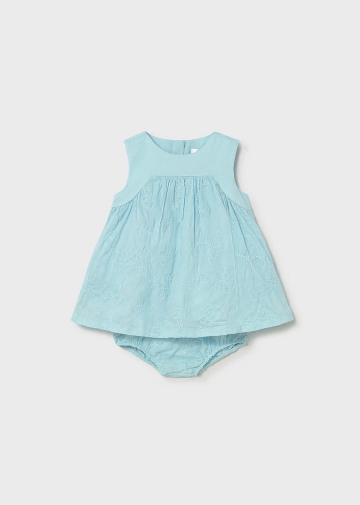 Light blue dress with matching bloomers on a white background