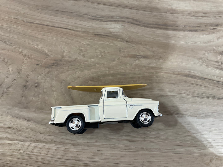 1955 Chevy Stepside die-cast pickup with surfboard