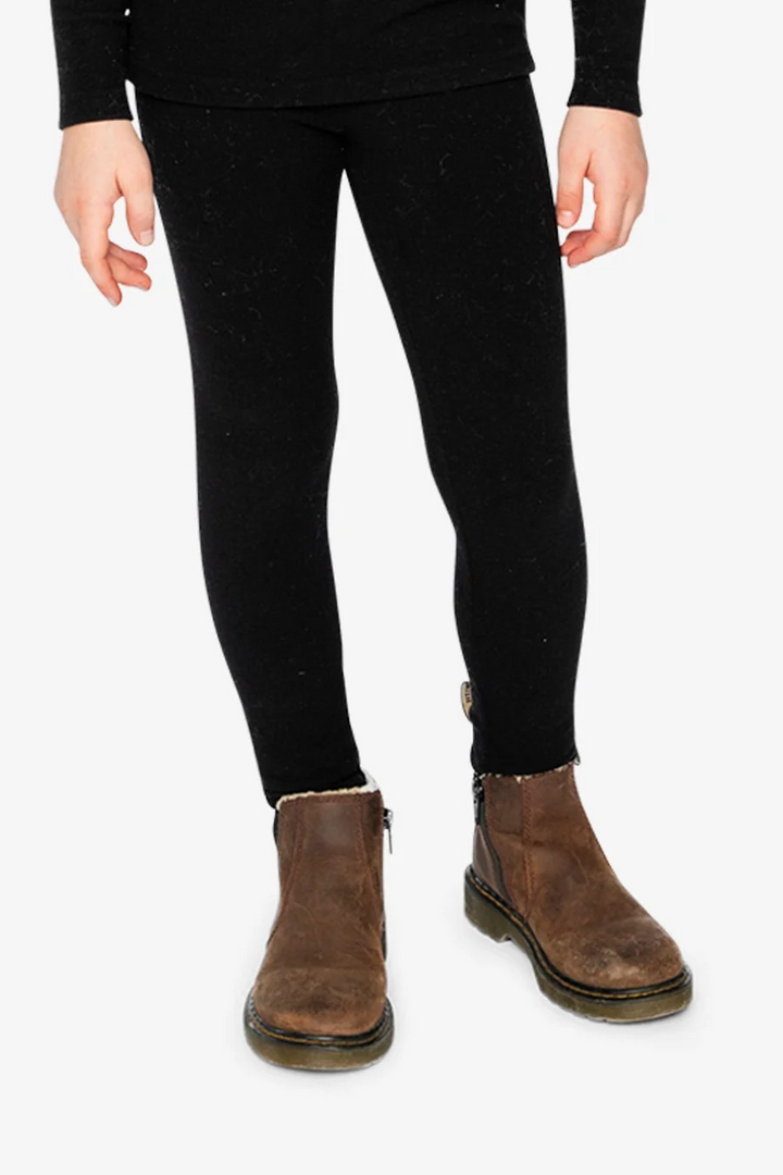 Deux Par Deux black leggings shown with brown ankle boots