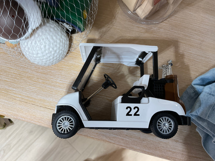 White number 22 die-cast pull-back golf cart