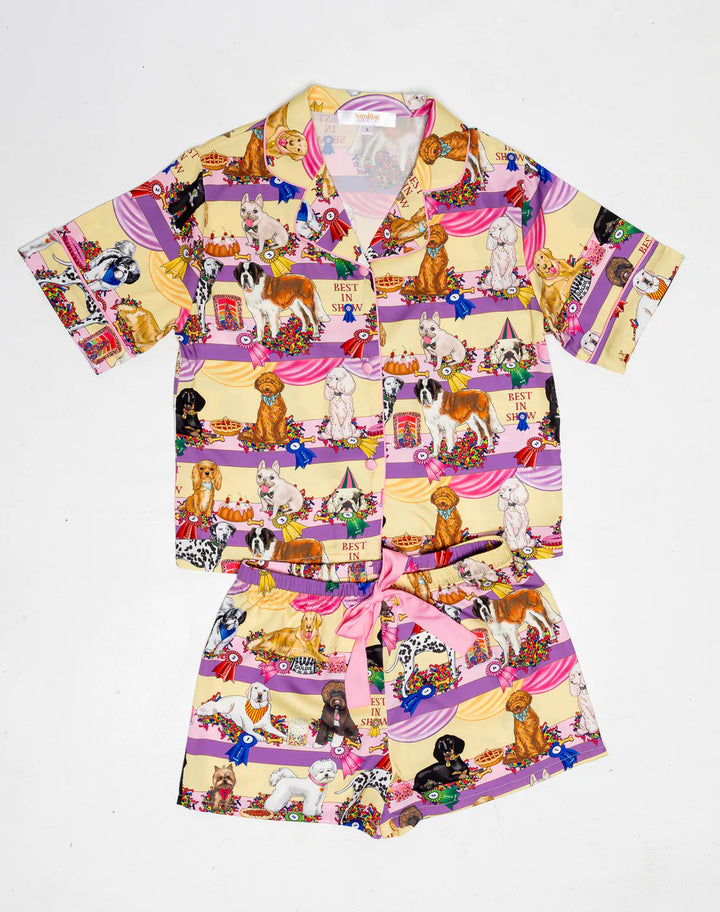Children's outfit with dog pattern on a white background best in show